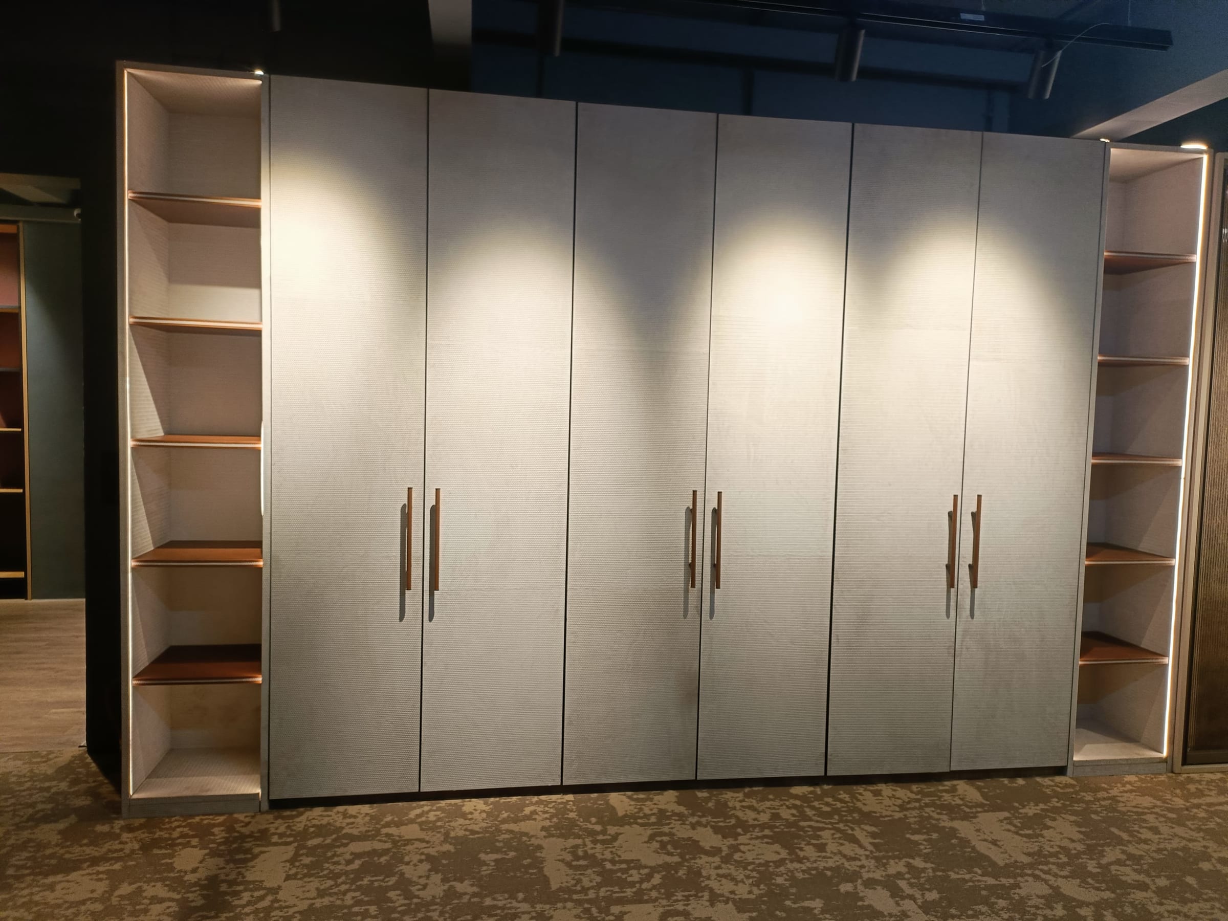 A six-door wardrobe with open side shelves, built in Gorakhpur